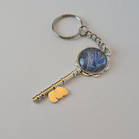 Blue and Silver Key-Shaped Key Chain