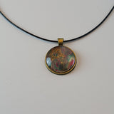 Red, Green, and Tan Round Pendant