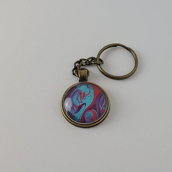 Blue, Pink, and Purple Round Key Chain