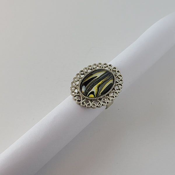 Black, White, and Yellow Ring