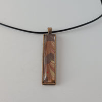 Red, Tan, and Gold Rectangular Pendant