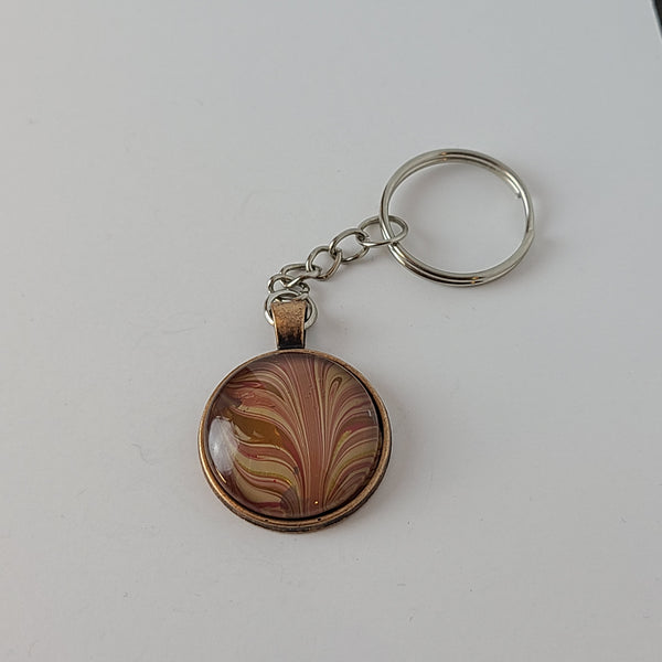 Red, Tan, and Gold Round Key Chain