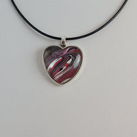 Pink, Black, and White Heart-Shaped Pendant