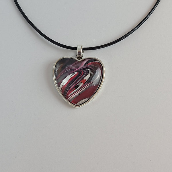 Pink, Black, and White Heart-Shaped Pendant