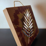 Red, Tan, and Gold Art Wood