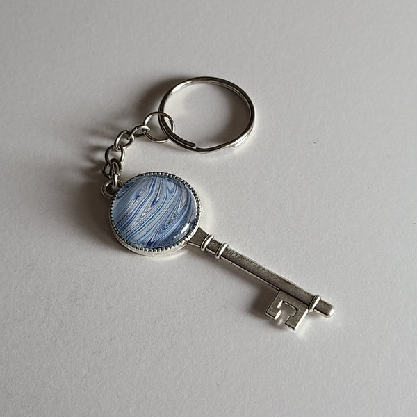 Blue, White, and Silver Key-Shaped Key Chain